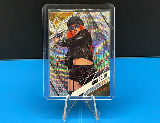 Trading card of Gigi Dolin in black clothing from Panini Chronicles Phoenix WWE