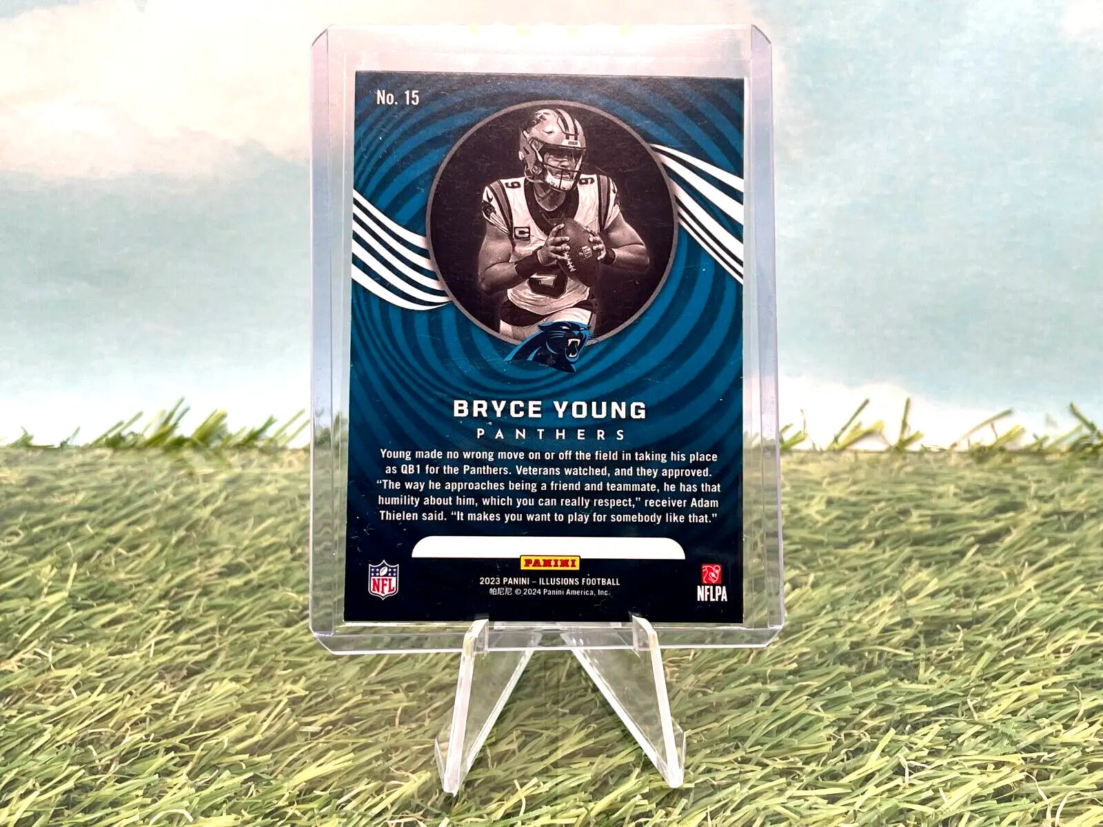 Bryce Young Rookie Card from 2023 Panini Illusions displays Carolina Panthers pride