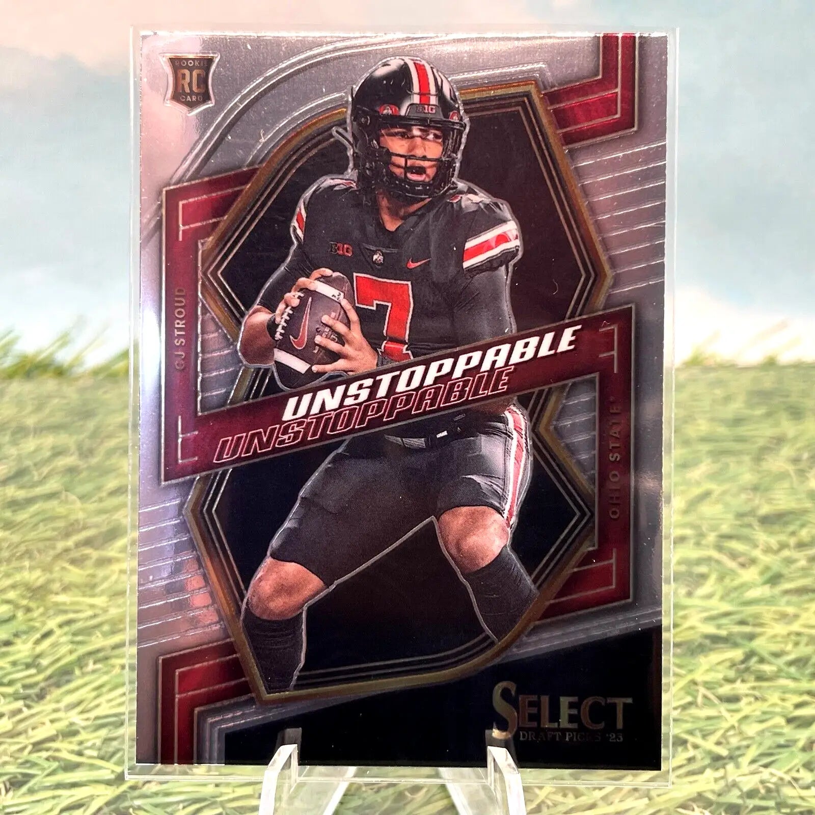 Football trading card of CJ Stroud in black and red uniform from Panini Select Draft