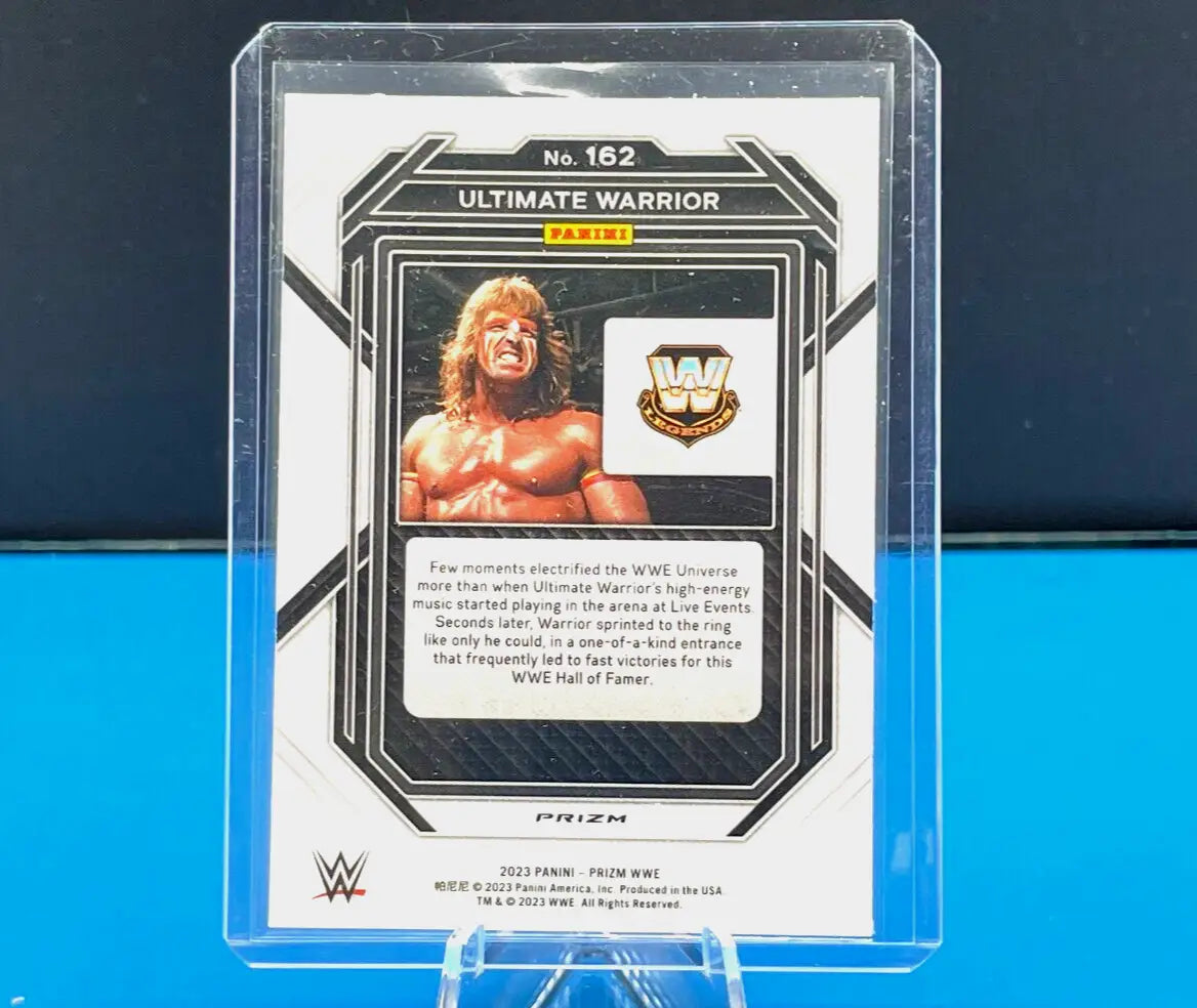 WWE Ultimate Warrior trading card in clear case, featuring Silver Cracked Ice design