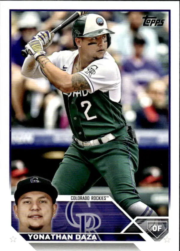 Baseball card of Yonathan Daza batting in green uniform for Colorado Rockies