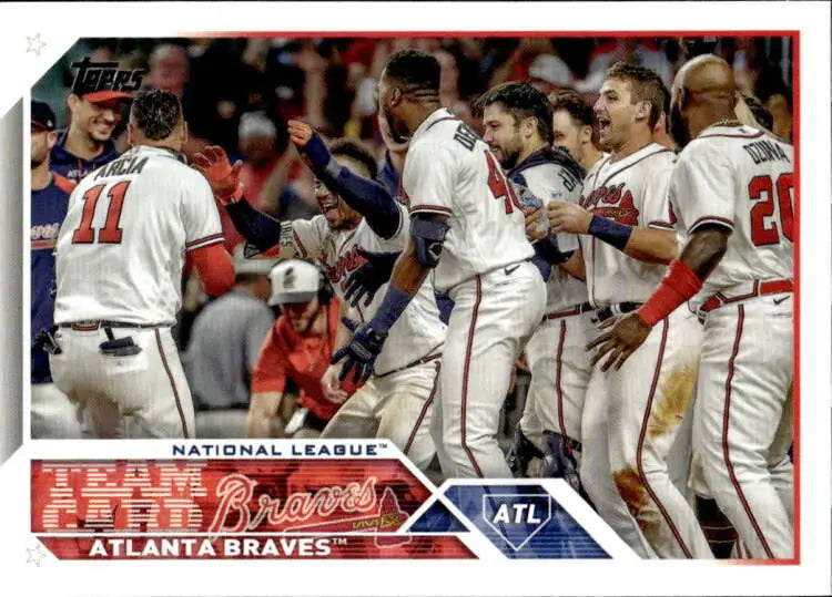 Atlanta Braves players celebrate on the field in 2023 Topps Team Card Baseball Card