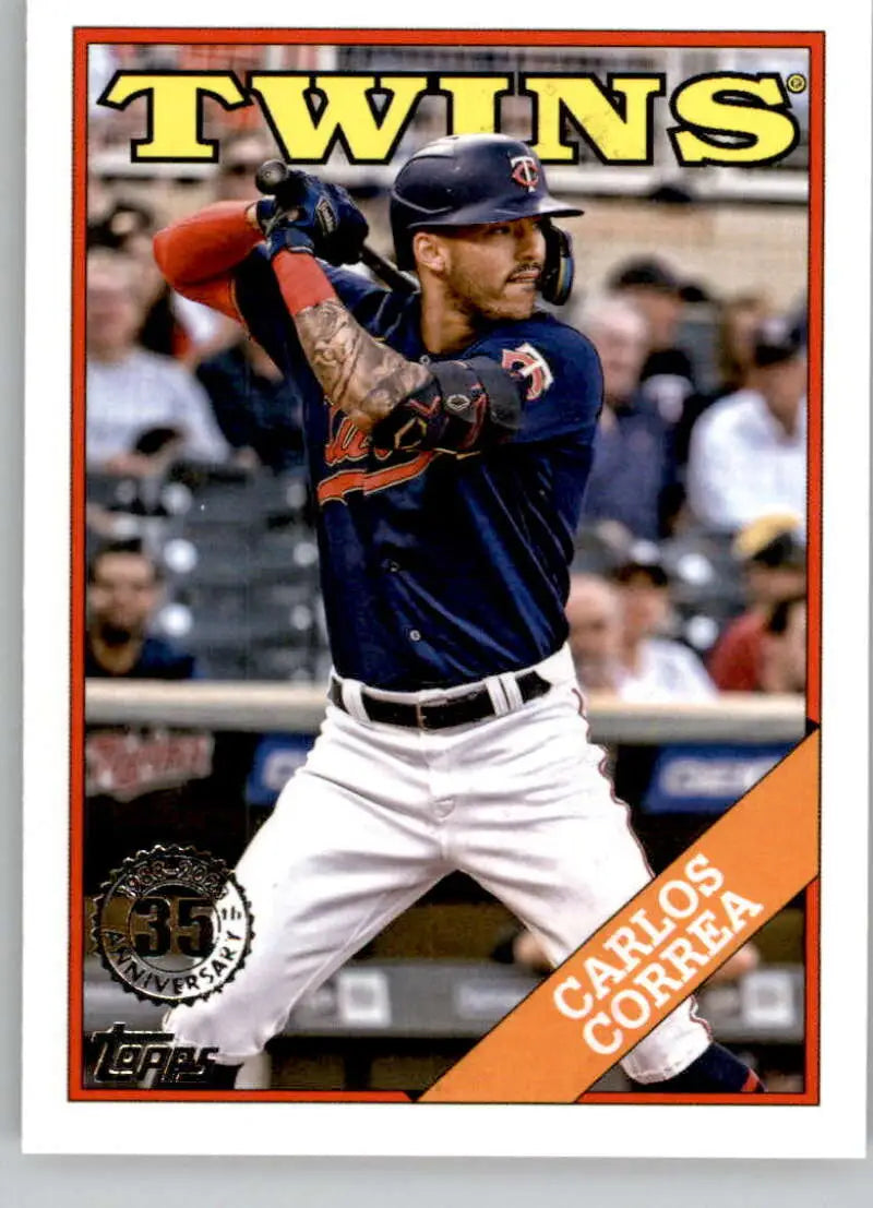 Carlos Correa batting in navy jersey on 2023 Topps Minnesota Twins baseball card