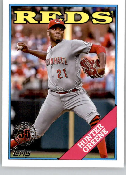 Baseball card of Hunter Greene, Cincinnati Reds pitcher in mid-throwing motion