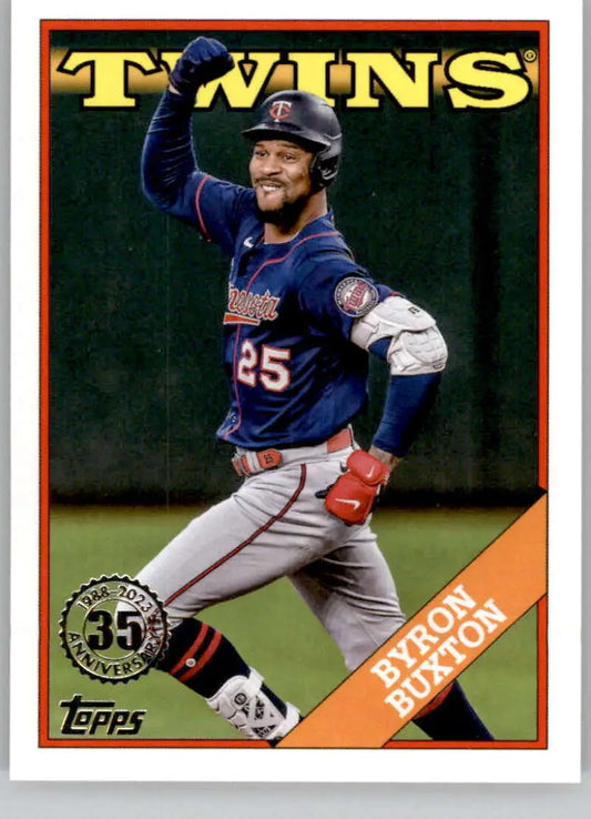 Byron Buxton celebrating in a navy uniform on a Minnesota Twins baseball card