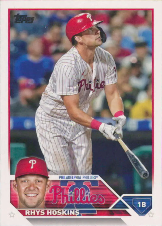 Rhys Hoskins at bat on a Philadelphia Phillies baseball trading card in pinstripes