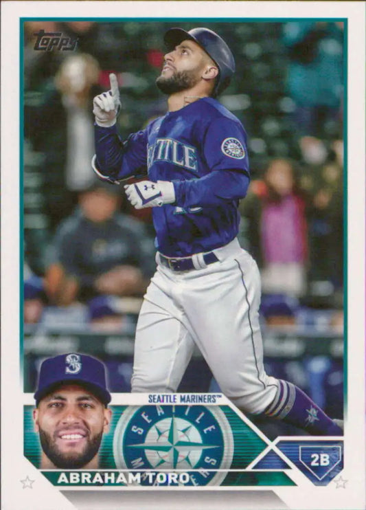 Abraham Toro in a purple uniform pointing up on a Seattle Mariners baseball card