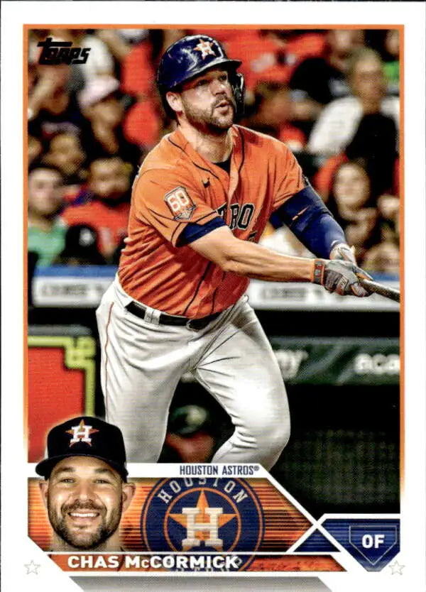 Baseball card of Chas McCormick in orange jersey for Houston Astros swinging bat