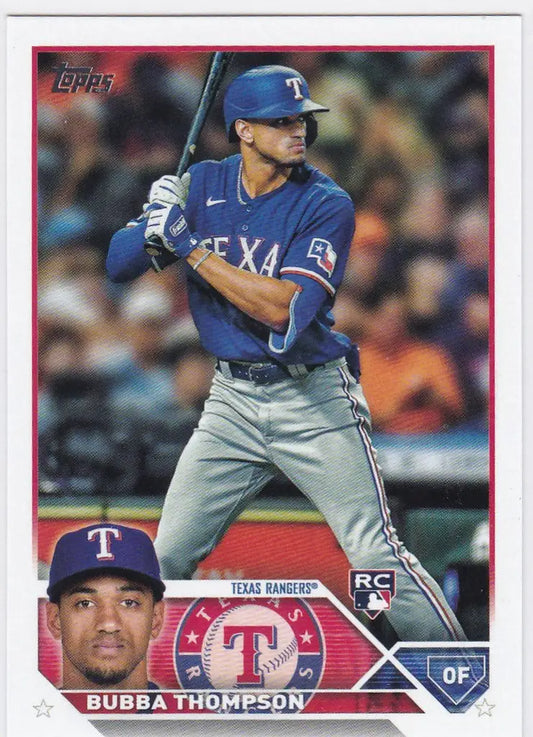 Baseball card of Bubba Thompson RC Texas Rangers player in blue uniform at bat