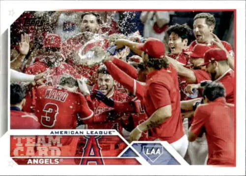 Baseball players in red Angels uniforms celebrating with water during Los Angeles Angels game