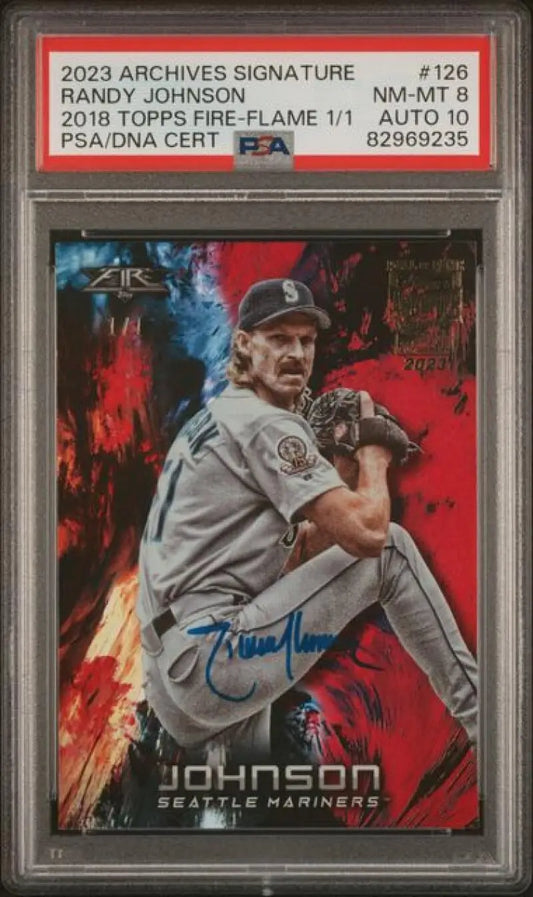 PSA-graded autographed baseball card of Randy Johnson, Seattle Mariners, against a red background