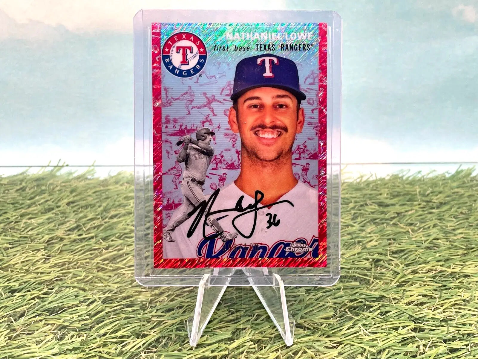 Signed Nathaniel Lowe Topps Chrome baseball card in clear stand for Texas Rangers fans