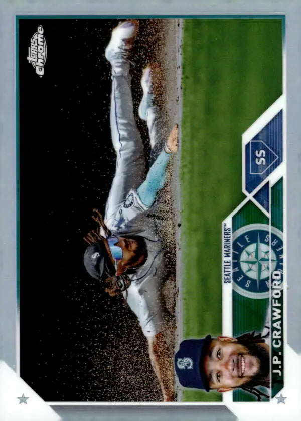 Baseball player sliding into base kicking up dirt on 2023 Topps Chrome Refractor card