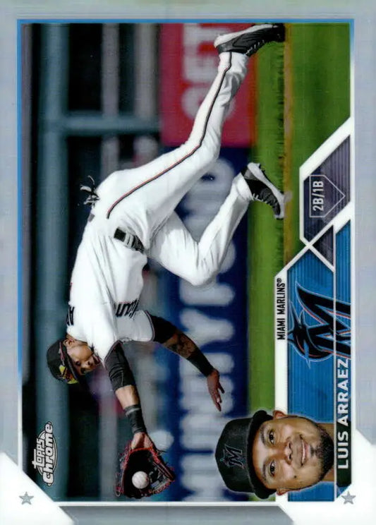 Luis Arraez making an acrobatic play in white uniform on Miami Marlins baseball card