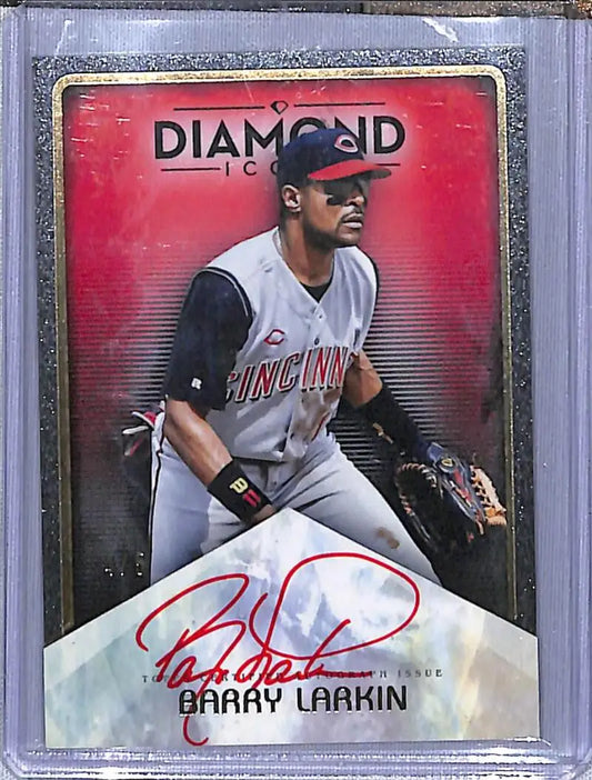 Baseball card featuring Barry Larkin in a gray Cincinnati Reds uniform with autograph