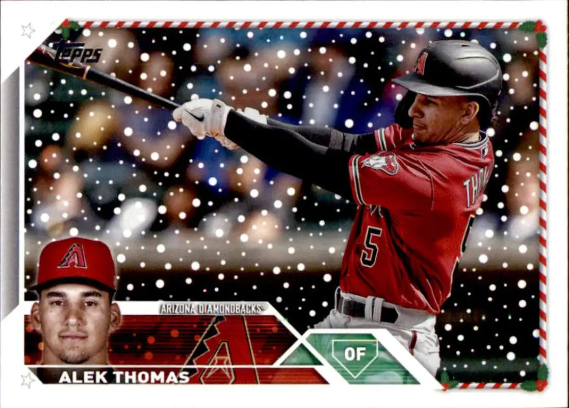 Alek Thomas in action on a Topps Holiday Arizona Diamondbacks baseball card with snowy effect