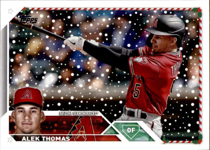 Alek Thomas in action on a Topps Holiday Arizona Diamondbacks baseball card with snowy effect