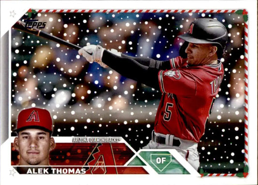 Alek Thomas in action on a Topps Holiday Arizona Diamondbacks baseball card with snowy effect