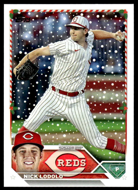 Baseball card of Nick Lodolo pitching in pinstriped uniform for Cincinnati Reds Topps Holiday