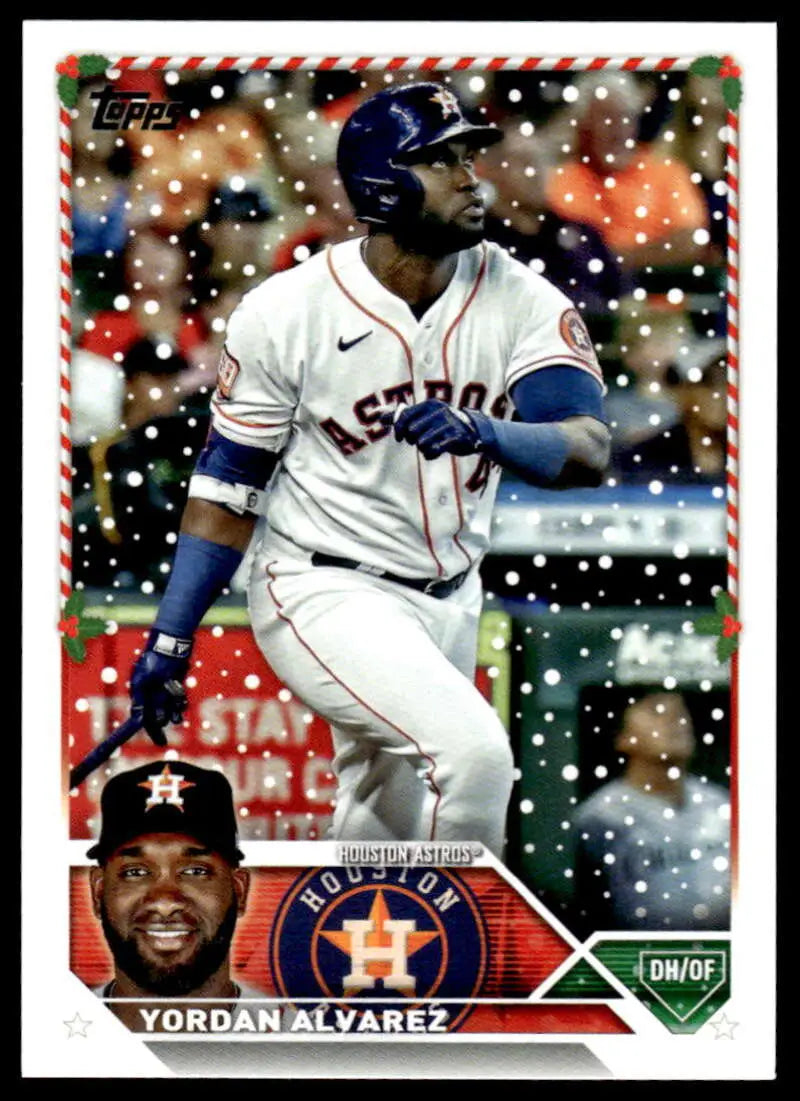 2023 Topps Holiday Yordan Alvarez Baseball Card in white uniform with snow overlay