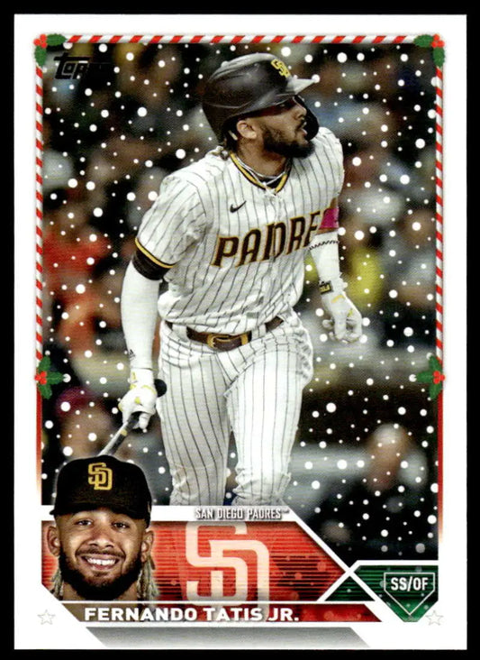 San Diego Padres baseball card of Fernando Tatis in pinstripe uniform with snowy overlay