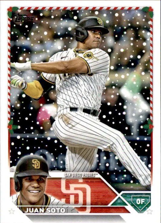 Baseball card of Juan Soto swinging bat in San Diego Padres pinstripe uniform