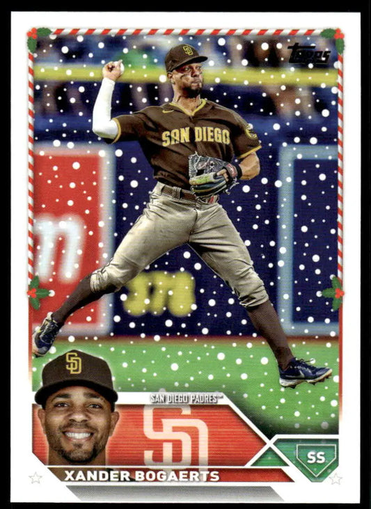 Baseball card of Xander Bogaerts in brown San Diego Padres uniform making a throw