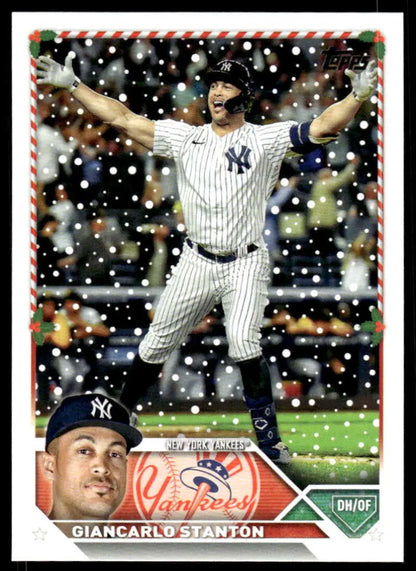 H25 Giancarlo Stanton celebrating in pinstripe uniform on 2023 Topps Holiday baseball card