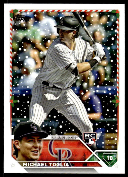 Michael Toglia batting in pinstripe uniform on Colorado Rockies baseball card