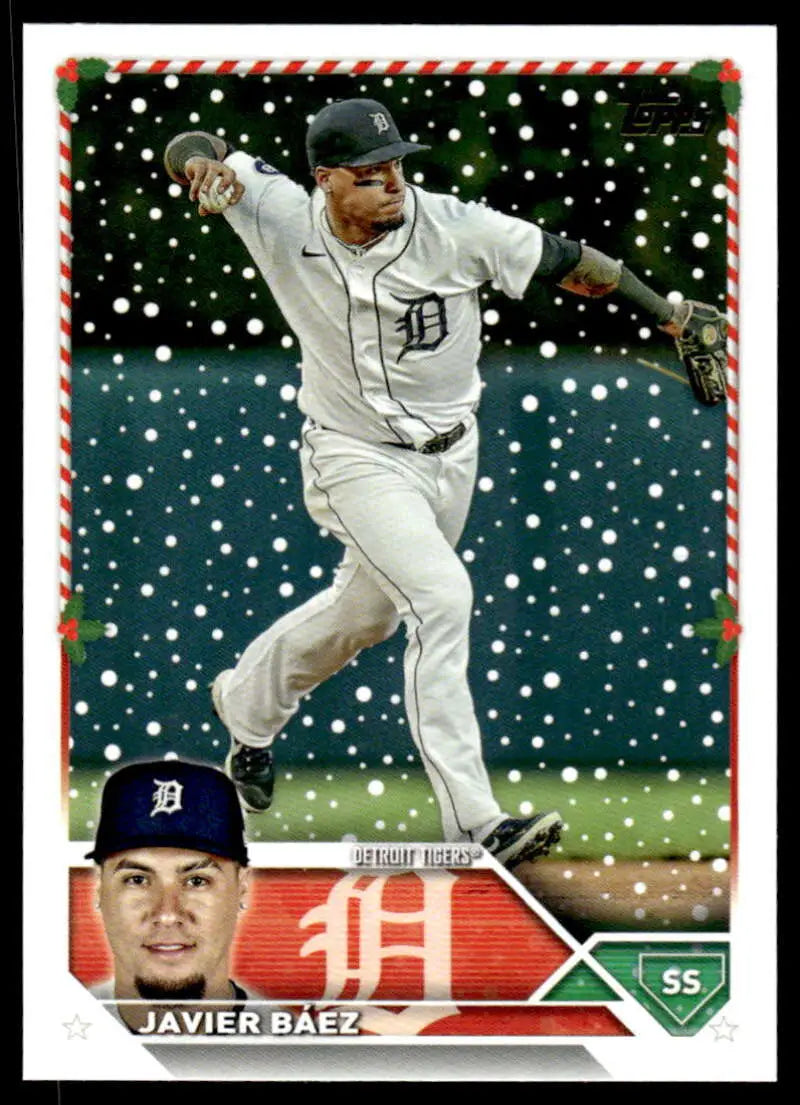 Javier Baez in white uniform making throw on 2023 Topps Holiday Detroit Tigers Baseball Card