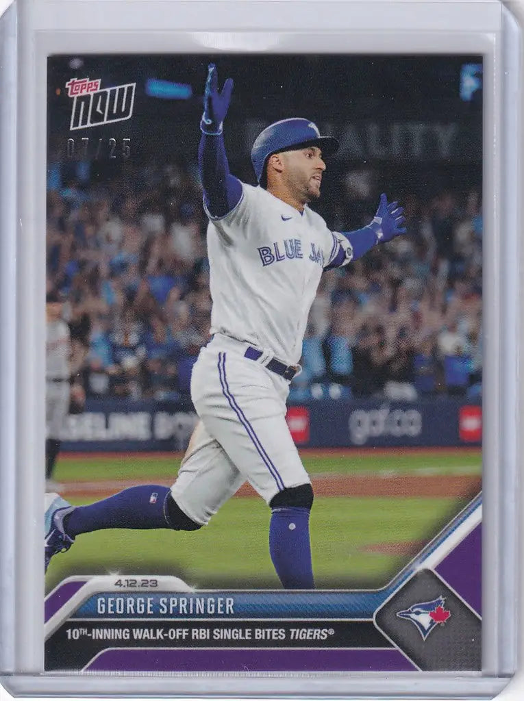 Baseball card of George Springer Toronto Blue Jays celebrating with arms raised