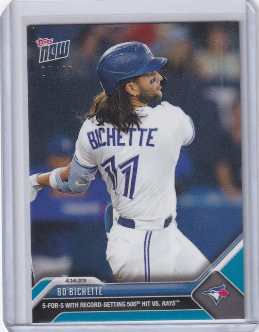 Baseball card of Bo Bichette Toronto Blue Jays player number 11 swinging a bat