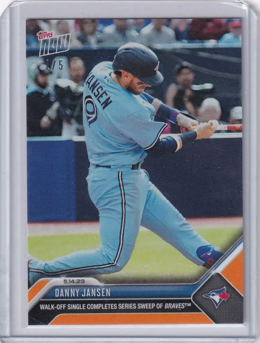 Baseball card of Danny Jansen swinging bat for Toronto Blue Jays 2023 TOPPS NOW Parallel