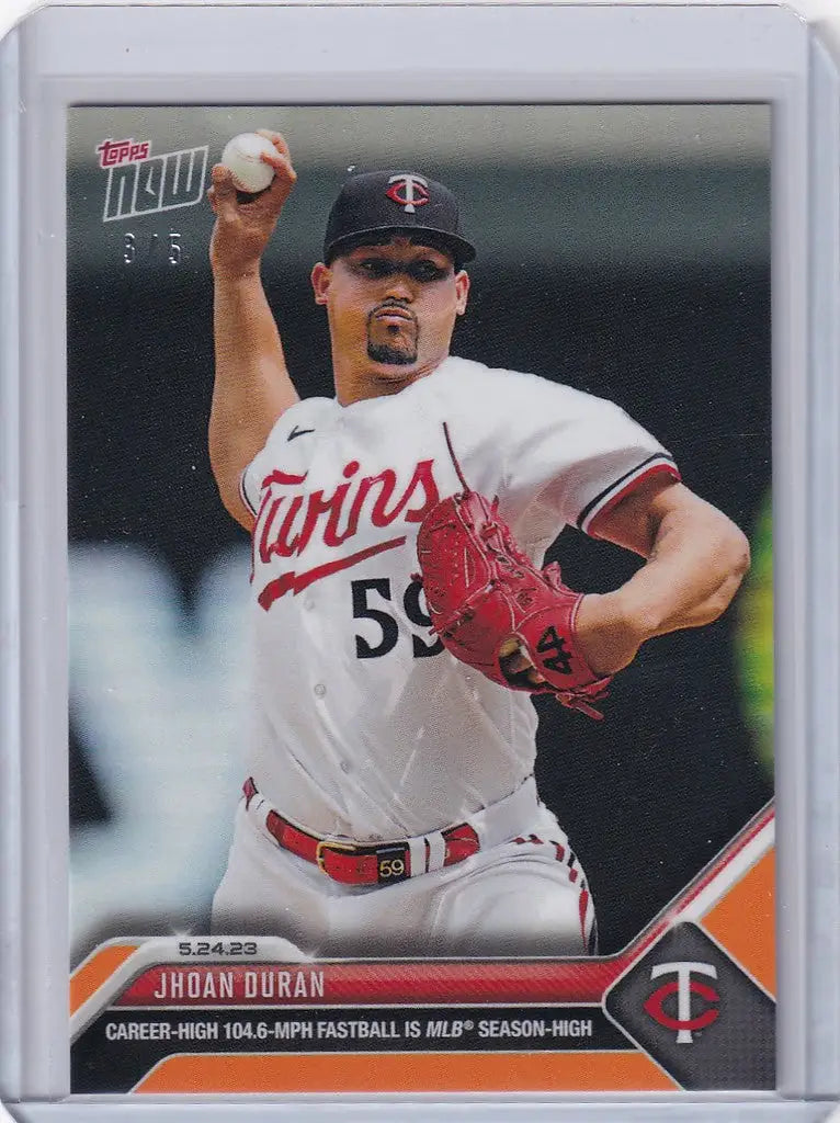 Baseball card of Jhoan Duran, Minnesota Twins pitcher in mid-throwing motion