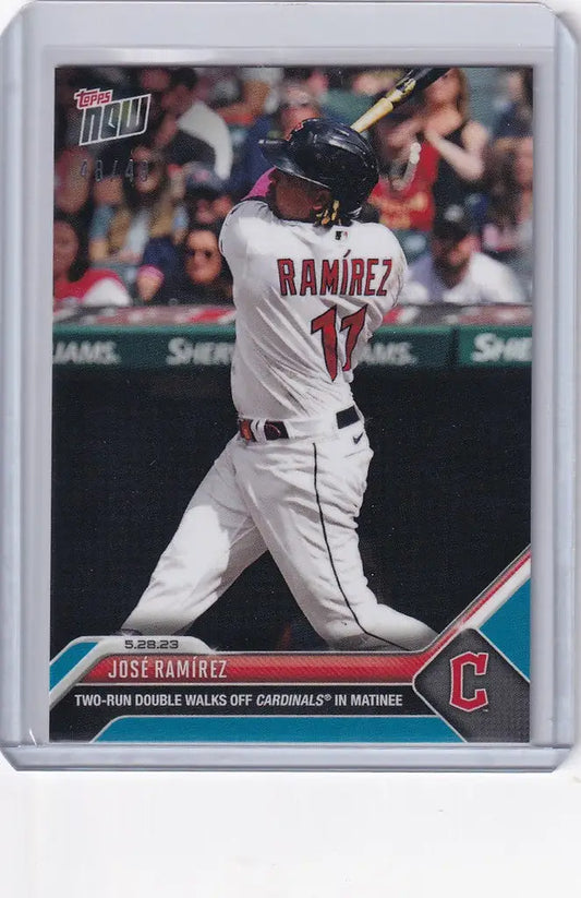 Baseball card of Jose Ramirez Cleveland Guardians swinging bat, jersey number 11