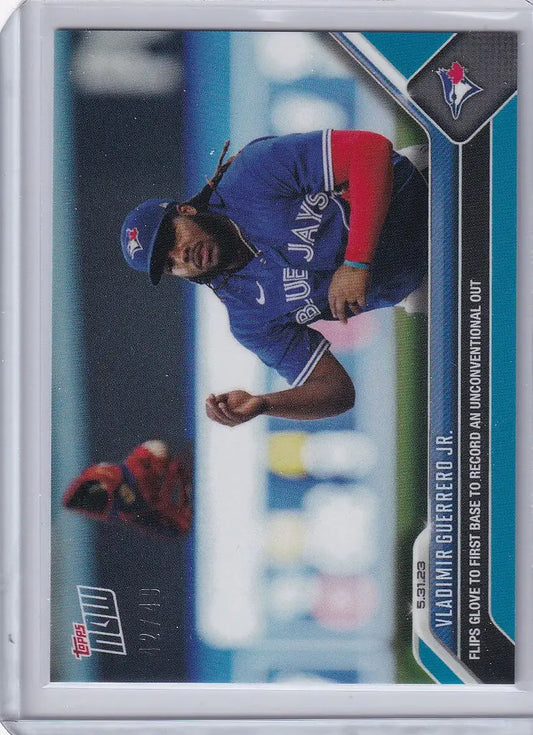 Baseball trading card of Vladimir Guerrero Toronto Blue Jays swinging bat in blue uniform