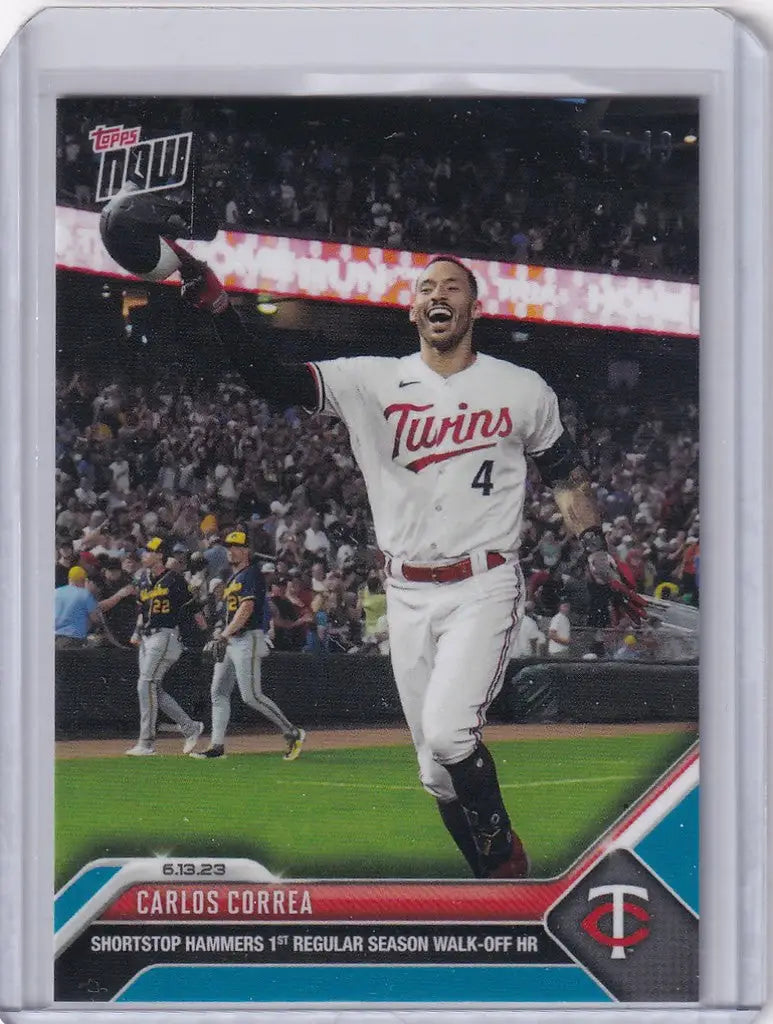 Baseball trading card of Carlos Correa celebrating with Minnesota Twins on field