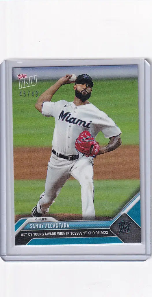 Baseball card of Sandy Alcantara, Miami Marlins pitcher, mid-throw on mound