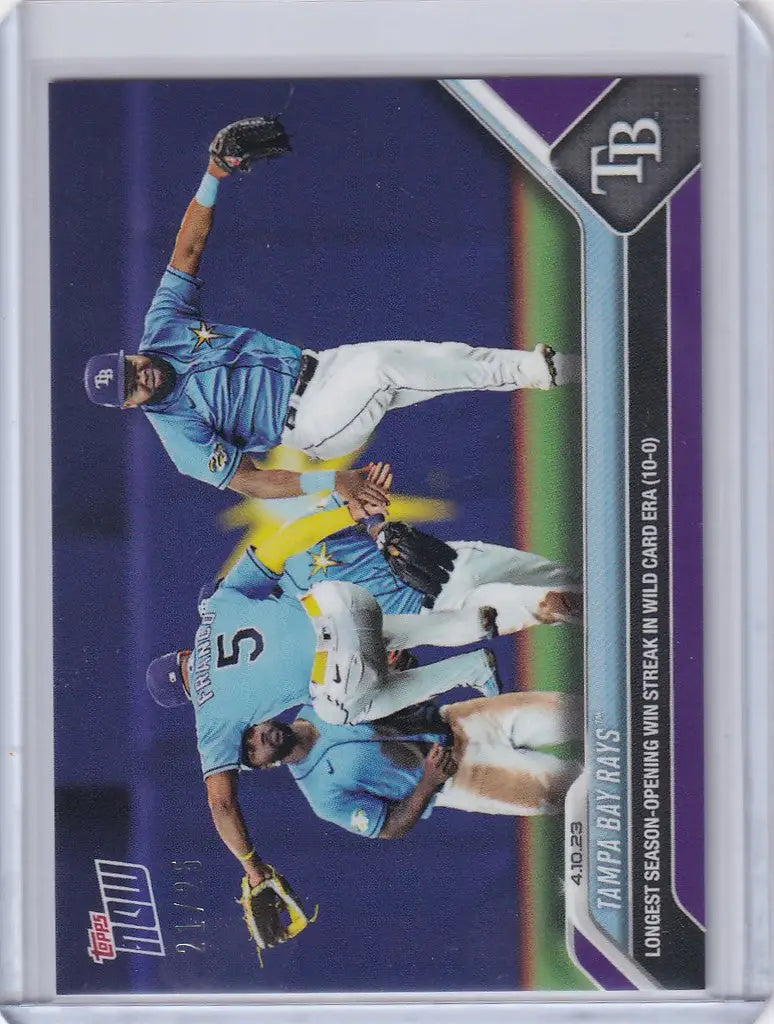 Baseball trading card of Tampa Bay Rays players in light blue uniforms making defensive plays