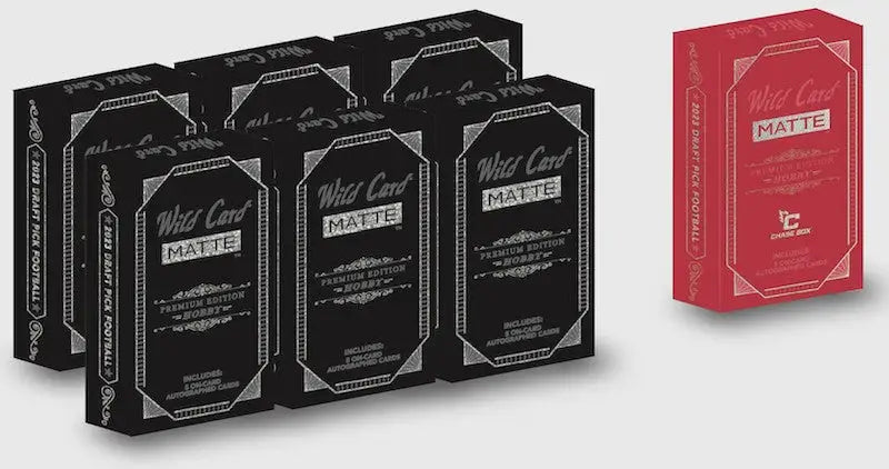 Playing card decks in black and red packaging featuring Bijan Robinson trading cards