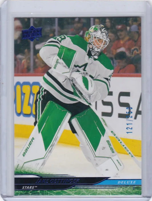 Dallas Stars goalie Jake Oettinger Deluxe in action making a save in 2024-25 Upper Deck