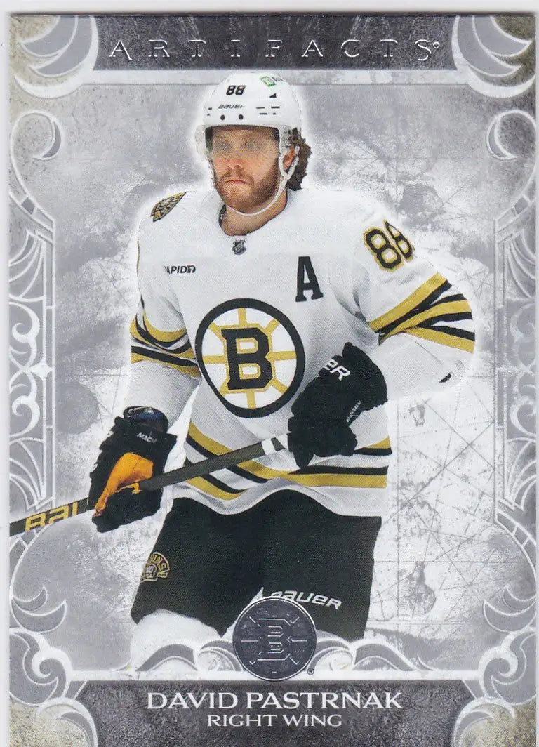 Hockey player in white Boston Bruins jersey, 2024-25 Upper Deck Artifacts #81 David Pastrnak