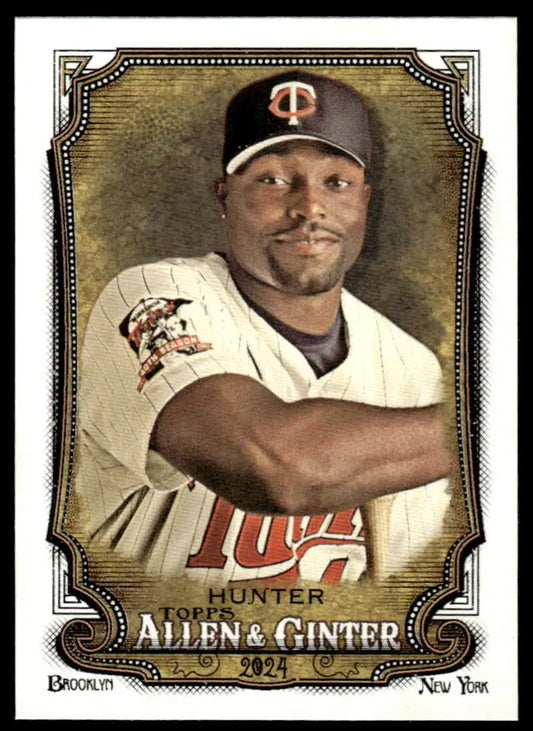 Minnesota Twins Torii Hunter baseball card in home white uniform and navy cap