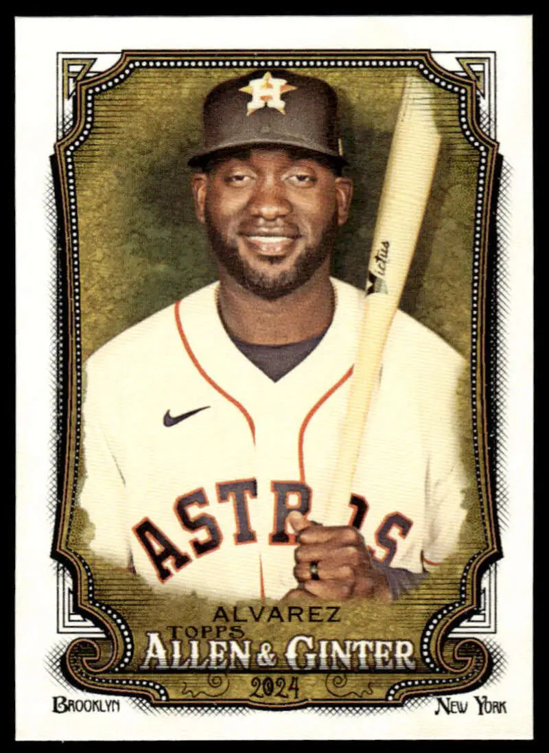 Yordan Alvarez holding a bat in Houston Astros jersey on 2024 baseball card