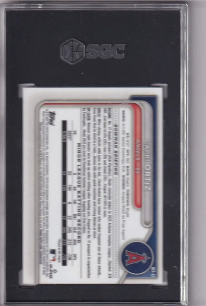 Baseball card in clear case featuring Capri Ortiz SGC logo from Angels collection