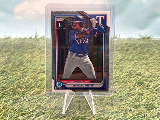 Baseball card of Abimelec Ortiz in batting stance, showcased in a protective case