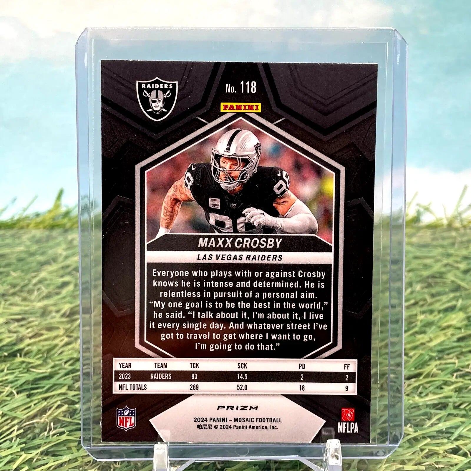 NFL trading card of Maxx Crosby in black uniform, featuring Silver Prizm Mosaic design