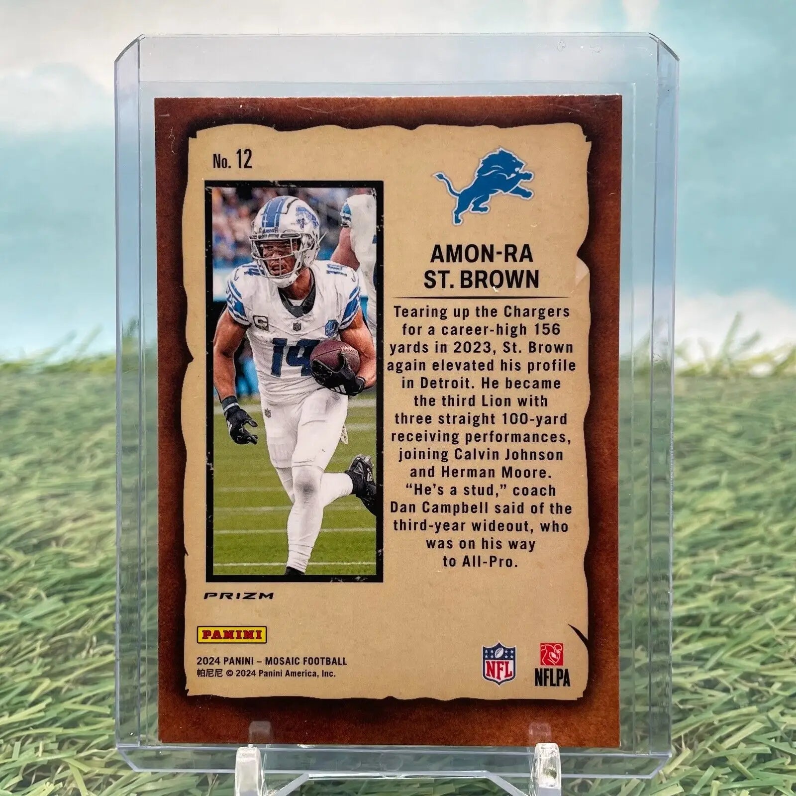 Amon-Ra St. Brown trading card from 2024 Panini Mosaic, Detroit Lions Notoriety Silver Mosaic