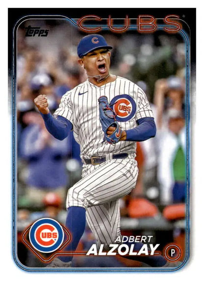 Chicago Cubs player Adbert Alzolay celebrates in pinstripe uniform on baseball card