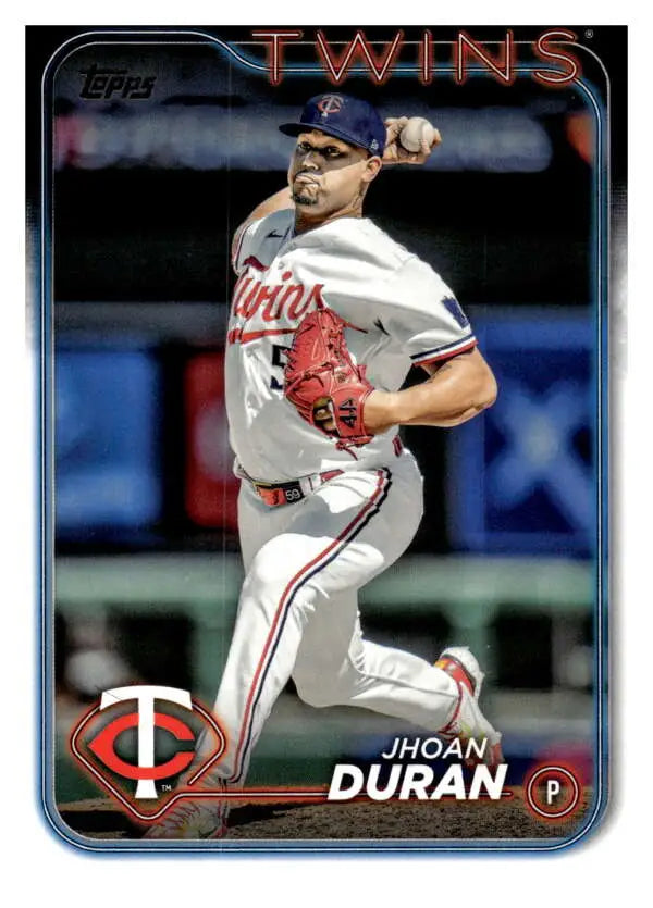 Jhoan Duran mid-pitch for Minnesota Twins featured on 2024 Topps baseball card